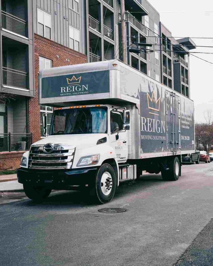 Moving truck outside a building