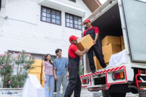 Professional movers unloading a truck