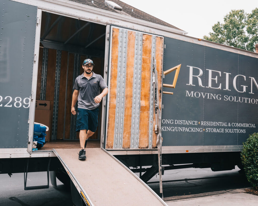 Man walking out of a moving truck