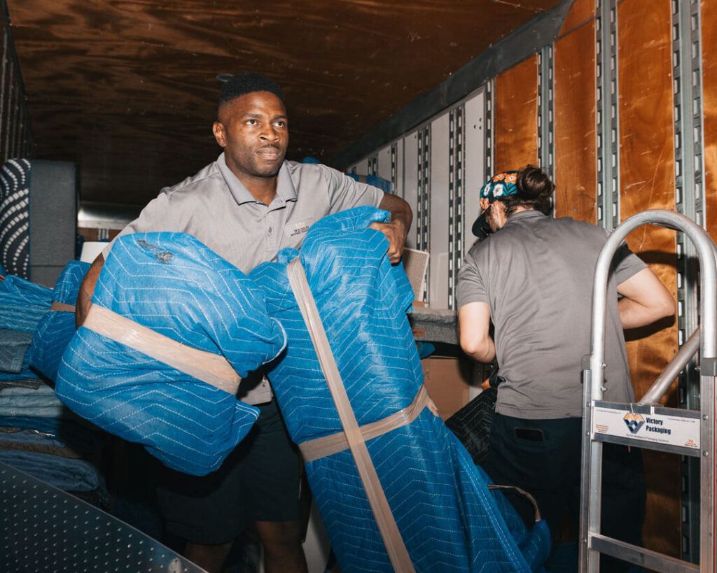 Movers unloading a truck